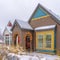 Facade of a colorful home viewed in winter