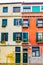 Facade of colorful Venetian gothic style buildings/homes in Venice, Italy.