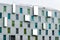 Facade of the contemporary, Art Otel in the city of Cologne, Germany, Green, blue and turquoise coloured windows