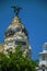 Facade decoration on old building with golden dome in Madrid