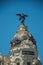 Facade decoration on old building with golden dome in Madrid