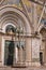 Facade details of the opulent and monumental Orvieto Cathedral in Orvieto.