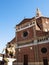 facade of Duomo di Pavia and monument Regisole