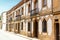 Facade of factory worker houses in Colonia Guell, Barcelona, Catalonia, Spain