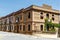 Facade of factory worker houses in Colonia Guell, Barcelona, Catalonia, Spain