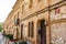 Facade of factory worker houses in Colonia Guell, Barcelona, Catalonia, Spain