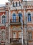 Facade fragment of art nouveau building with arch windows