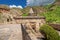 Facade of Geghard Monastery and Church carved in rock in Armenia is an important tourist and religious pilgrimage point in