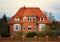 Facade of a german brick house in the evening sun. Mecklenburg-Western Pomerania, Germany