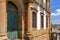 Facade of a historic building and its columns, doors and windows in baroque architecture