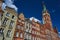 Facade historic tenement houses building and town hall