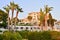 The facade of the hotel coral Bay Paphos, Cyprus, June 2017. Terraces, cvetochik with thickets of shrubs and trees