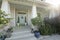 Facade of a house with curb appeal and mint green front door