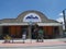 Facade of the Local Kitchen Provisions, one of the restaurants at Driggs, with diners at the door