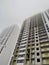 Facade of modern building in city. From below of constructing exterior of contemporary multistory building with glass