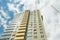 Facade of a multifamily house on blue sky backgrounds