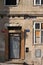 The facade of the old abandoned house. Windows and the input arrays