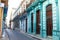 Facade of an old building and narrow street  in the old historical center in Havana, Cuba, Caribbean