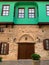 A facade of an old historical, building Ottoman time architecture in Antalya Old town Kaleici, Turkey. Vertical image