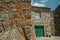 Facade of old house in deserted alley at Monsanto