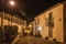 Facade of old houses with light post at dusk in Marvao