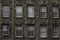 A facade of an old palace with 2 rows of windows in Edinburgh old town