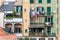 Facade of a old residential building in Savona, Liguria, Italy