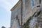 Facade of an old ruined house on a stone wall in the old town of Porec Parenzo, in the Istrian Peninsula, Croatia