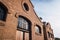 Facade of the old train workshop factories in the Central Park of Valencia