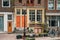 Facade of old typical house in Amsterdam historical center, Netherlands