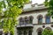 Facade of old vintage architecture building with balconies in street in city, Luxury property