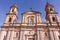 Facade of  The Primada Cathedral of BogotÃ¡ stands in the framework of the Plaza de BolÃ­var, in the center of the city. Bogota