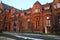 Facade of red castle Hradec nad MoravicÃ­ in the evening