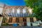 The facade of the ruins of an old building that houses a Christian congregation