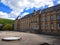 Facade and square or patio of Abbey of Echternach Basilica of Saint Willibrord in the old town of Echternach, Luxembourg, with a