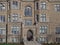 facade of stone gothic style college building