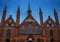 Facade and towers of the Holy Spirit Hospital, named Heiligen Geist Hospital in the old town of Luebeck, a historic brick building