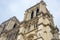 Facade and towers of the Notre Dame Cathedral in Paris