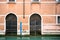 Facade of a traditional building partially in the canal in Venice, Italy