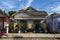 The facade of a traditional colorful house in the Marigny neighborhood in the city of New Orleans, Louisiana