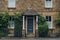 Facade of a traditional house in Broadway, Cotswolds, UK