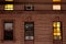 Facade of a typical brownstone apartment building at night, in Harlem, New York City, NY, USA