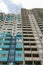 Facade of typical high rise apartment building with balcony and windows. Contemporary architecture. Selective focus. Close-up