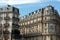 Facade of typical house with balcony in 16th arrondisement of Paris.