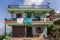 Facade of a typical Nepalese house in a mountain village near Pokhara