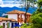 Facade view of clay rooftops with some colorful buildings in Pueblito Paisa in Nutibara Hill, reproduction of the