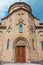 Facade wall and central entrance doors to church