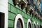 Facade wall on green plastered background in San Juan, Puerto Rico