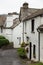 Facade of a white buildings in the village of Hawkshead, England, UK