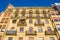 Facade of a yellow apartment building in San Sebastian